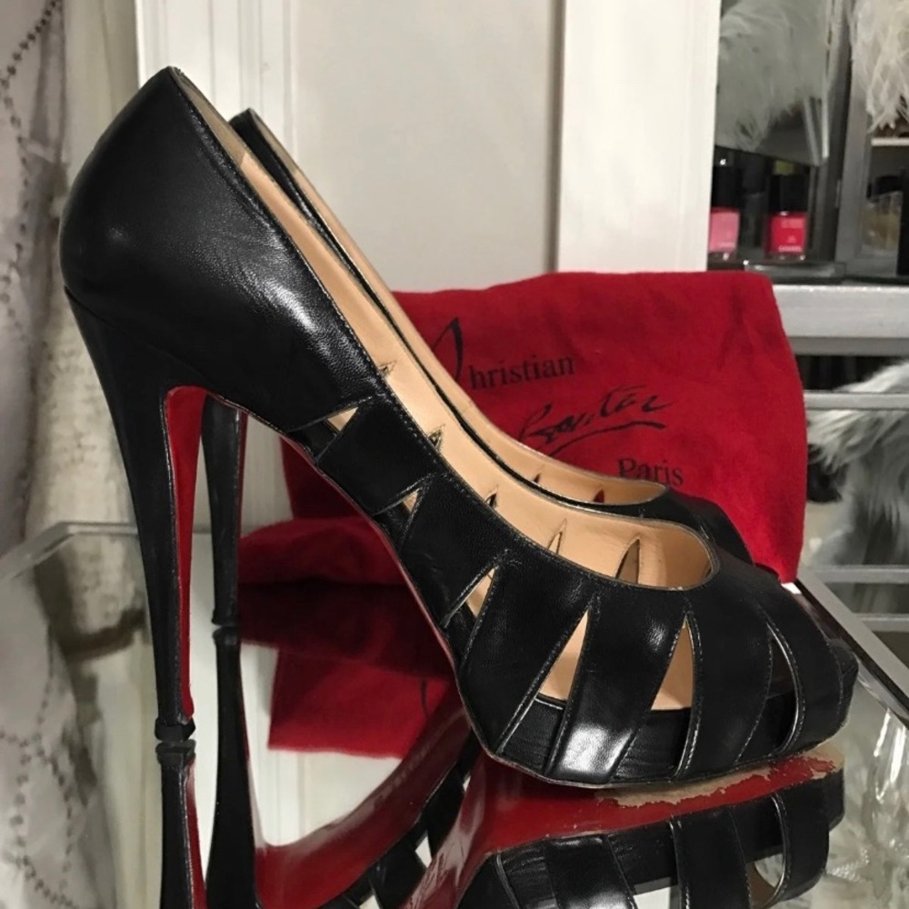 Christian louboutin peep toe pumps